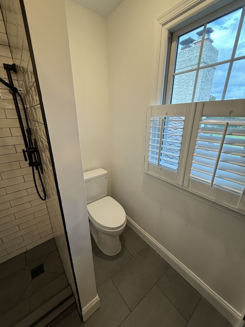 Bathroom renovation with separate water closet, plantation shutters and tiled shower, Chester County PA